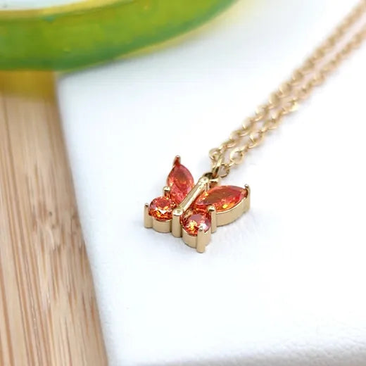 Collier papillon orange en acier inoxydable